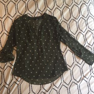 Sheer, long sleeve green top with stars